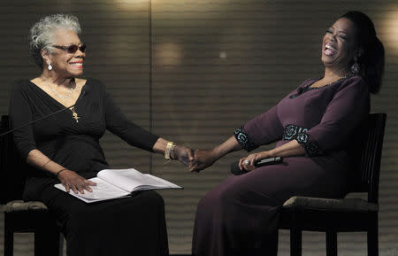 Oprah Winfrey (R) laughs with poet Maya Angelou during the taping of "Oprah's Surprise Spectacular" in Chicago May 17, 2011. REUTERS/John Gress