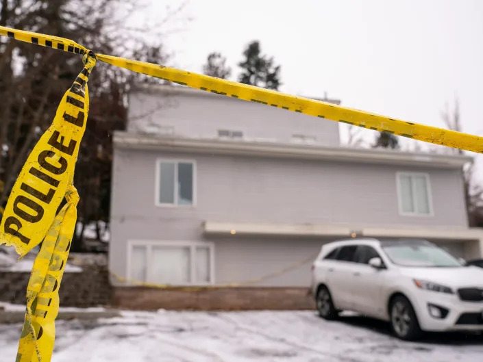 Police tape is seen at the Moscow, Idaho, home that is the site of the November 13 killings of four University of Idaho students.