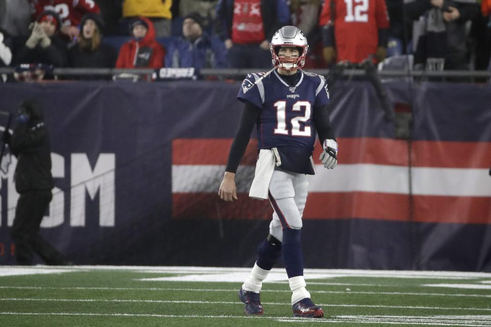 New England Patriots quarterback Tom Brady walks to the sideline after throwing an interception late in the second half of an NFL wild-card playoff football game against the Tennessee Titans, Saturday, Jan. 4, 2020, in Foxborough, Mass. (AP Photo/Elise Amendola)