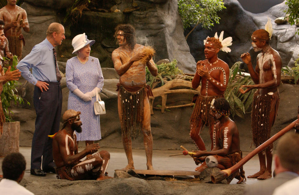 Britain's Queen Elizabeth II and the Duke of Edinburgh watching a culture show at Tjapukai Aboriginal Culture Park, Cairns, Queensland. The Duke surprised the aborigines when he asked them 