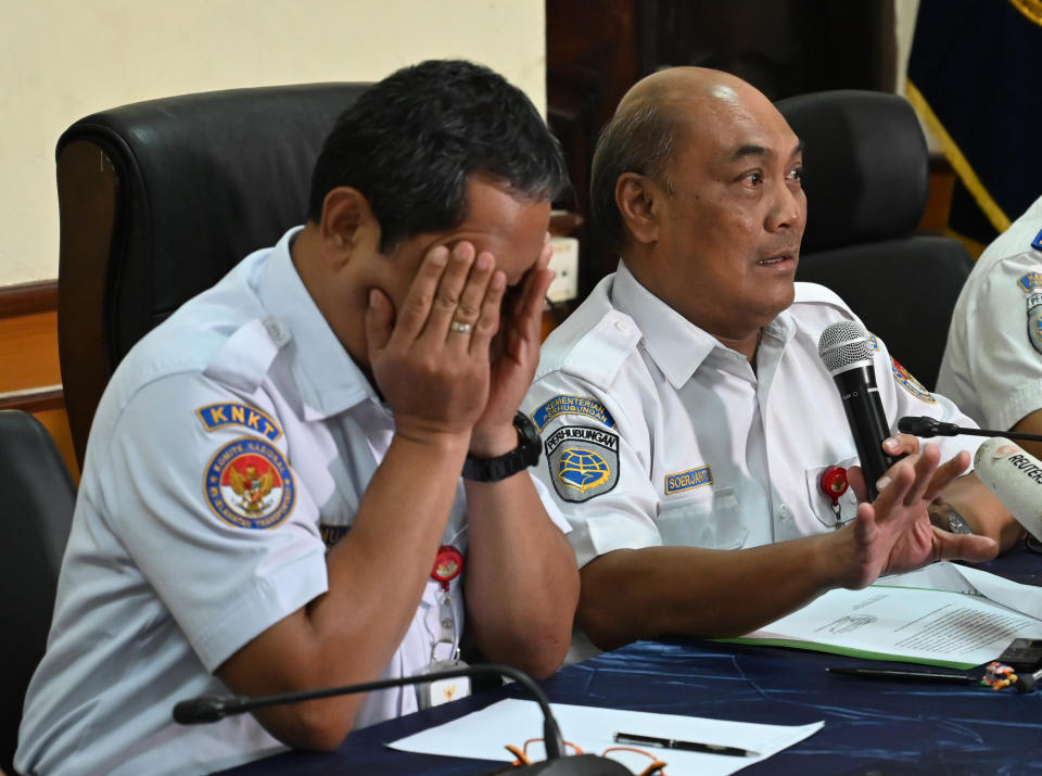 Soerjanto Tjahjono (R), the head of Indonesia's national transportation safety committee (KNKT) and Nurcahyo (L), head of the flight accident sub-committee of KNKT, brief journalists during a press conference about the Lion Air Boeing 737 Max 8 crash in 2018, in Jakarta on March 21, 2019. (Photo by BAY ISMOYO / AFP)        (Photo credit should read BAY ISMOYO/AFP/Getty Images)