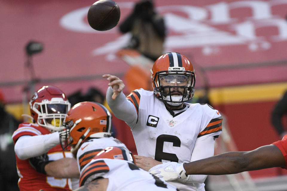 Cleveland Browns quarterback Baker Mayfield throws a pass during the second half of an NFL divisional round football game against the Kansas City Chiefs, Sunday, Jan. 17, 2021, in Kansas City. The Chiefs won 22-17. (AP Photo/Reed Hoffmann)