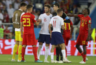 <p>Gary Cahill shakes hands with Belgium’s Leander Dendoncker at the end of the match in Kalingrad </p>