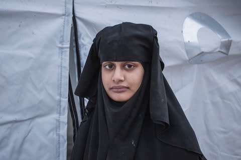 Shamima Begum stands outside her tent in al-Hol camp before she was moved to another one - Credit: Sam Tarling
