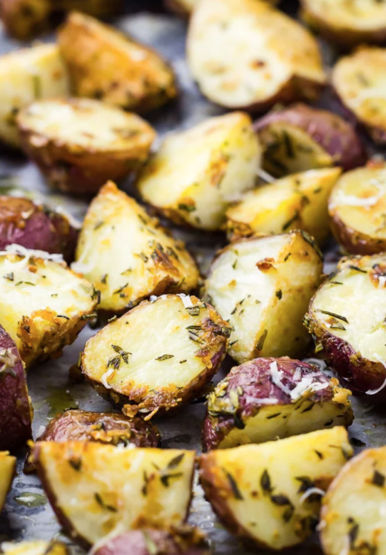 <p>No Spoon Necessary</p><p>These asiago, garlic and herb-roasted red potatoes are crispy on the outside, tender on the inside and loaded with flavor!</p><p><strong>Get the recipe: <a href="https://www.nospoonnecessary.com/asiago-garlic-herb-roasted-red-potatoes/" rel="nofollow noopener" target="_blank" data-ylk="slk:Asiago Garlic Herb Roasted Red Potatoes;elm:context_link;itc:0;sec:content-canvas" class="link rapid-noclick-resp">Asiago Garlic Herb Roasted Red Potatoes</a></strong></p>