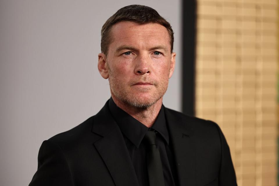 <p>Jamie McCarthy/Getty</p> Sam Worthington at the Netflix