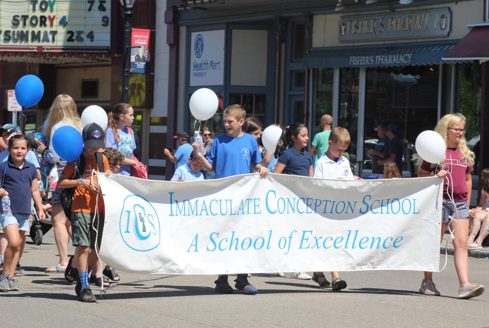 Immaculate Conception School students march in the 2019 Great Wellsville Balloon Rally Parade. The Diocese of Buffalo announced that the school will cease operations.