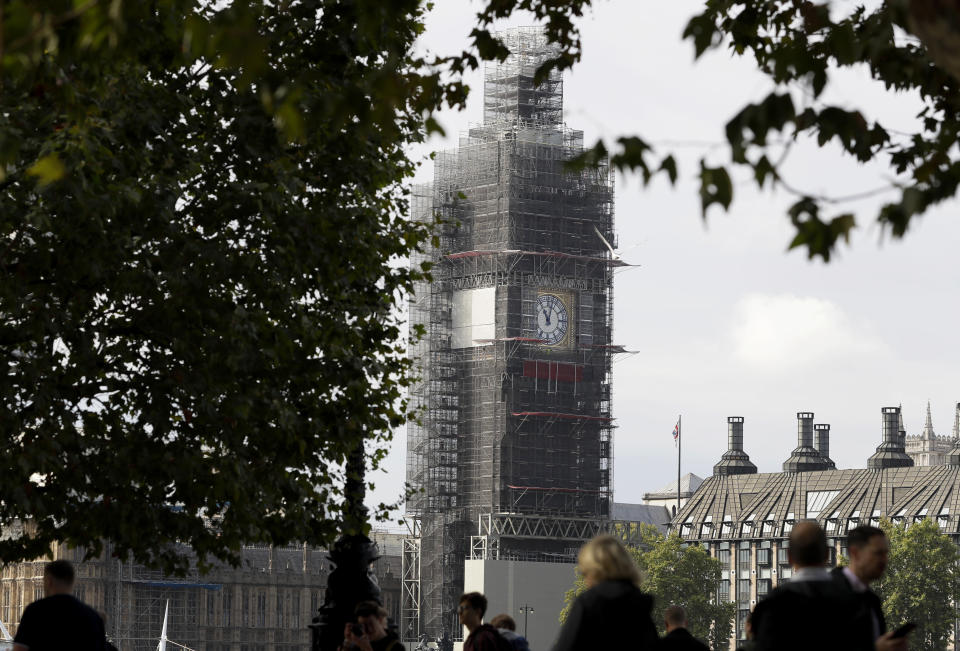 Scaffolding surrounds the Elizabeth Tower housing the Big Ben clock of Britain's Parliament in London, Monday, Sept. 30, 2019. Prime Minister Boris Johnson has vowed that Britain will leave the European Union on the scheduled date of Oct. 31, with or without a divorce deal governing future relations with the bloc. (AP Photo/Kirsty Wigglesworth)