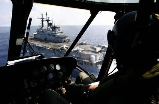 Italian AV8 Harrier aircrafts on Italian aircraft carrier "Giuseppe Garibaldi" are pictured from a SH3 D helicopter during the NATO operation codenamed "Unified Protectors" on June 15, in the Mediterranean Sea. Moamer Kadhafi's regime told visiting Russian envoy Mikhail Margelov that the embattled Libyan leader is "not ready" to go, despite growing calls for him to quit and a months-long uprising