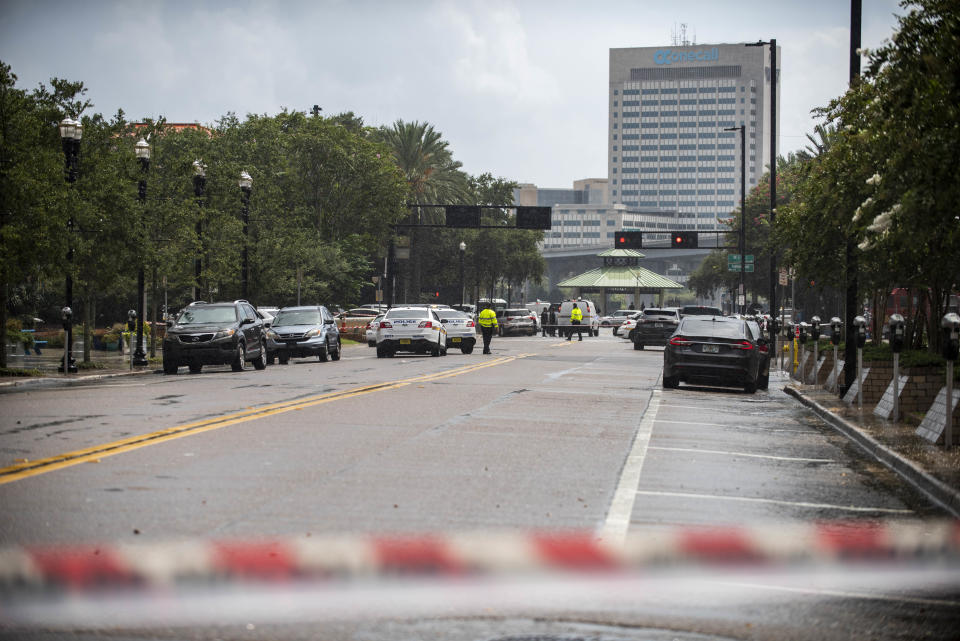 Police barricade a street near the Jacksonville Landing in Jacksonville, Florida, after a mass shooting at the riverfront mall that was hosting a video game tournament. Source: AP Photo/Laura Heald