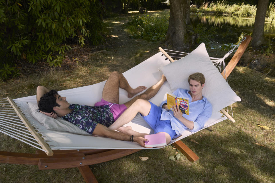 This image released by Amazon Studios shows Taylor Zakhar Perez, left, and Nicholas Galitzine in a scene from "Red, White & Royal Blue." (Jonathan Prime/Amazon Studios via AP)