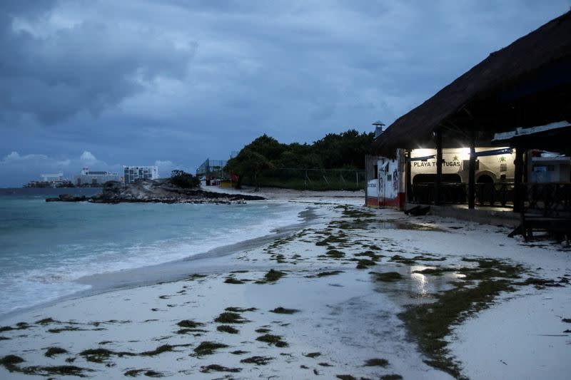 A general view shows an empty beach as Hurricane Delta approaches Cancun, Mexico