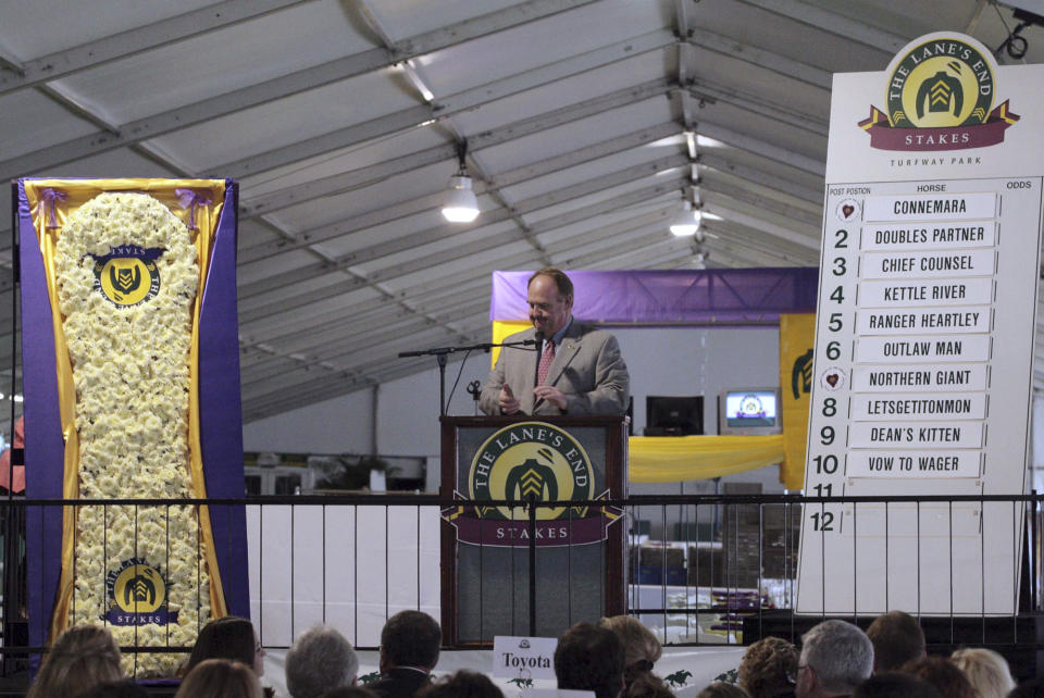 FILE - In this March 25, 2010 photo, Bob Elliston, president of Turfway Park, talks about the field for the Lane's End Stakes horse race at the track in Florence, Ky. Times are tough at Turfway Park, and the odds look even longer now that slot machines won't offer a lifeline. From the backside to the executive offices, there ís grim talk that without an infusion of casino gambling money the winter haven for Kentucky horse racing could someday turn into a shopping mall. (AP Photo/The Enquirer, Ernest Coleman, File) MANDATORY CREDIT NO SALES