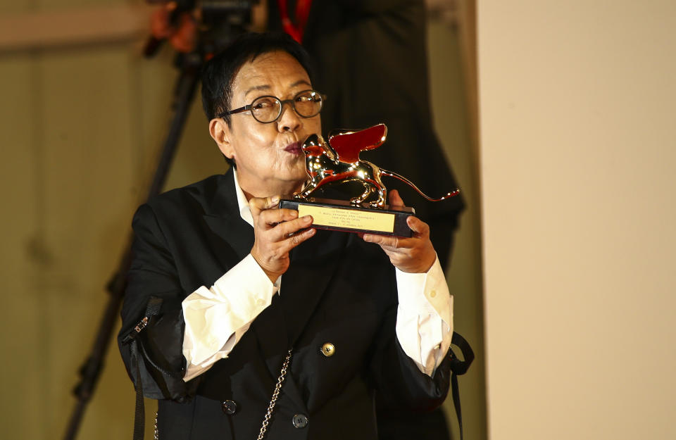 Director Ann Hui holds her Golden Lion award for Lifetime Achievement during the 77th edition of the Venice Film Festival in Venice, Italy, Tuesday, Sept. 8, 2020. (Photo by Joel C Ryan/Invision/AP)