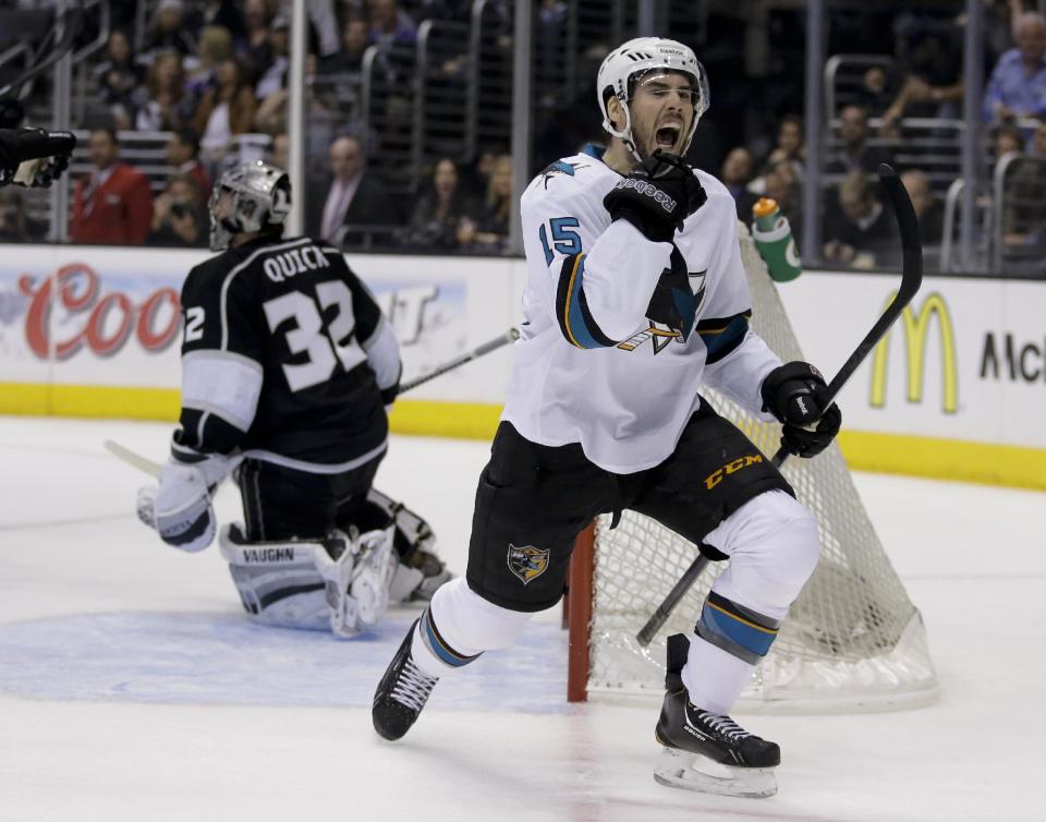 San Jose Sharks left wing James Sheppard, right, celebrates his goal past Los Angeles Kings goalie Jonathan Quick during the first period in Game 4 of an NHL hockey first-round playoff series in Los Angeles, Thursday, April 24, 2014. (AP Photo/Chris Carlson)