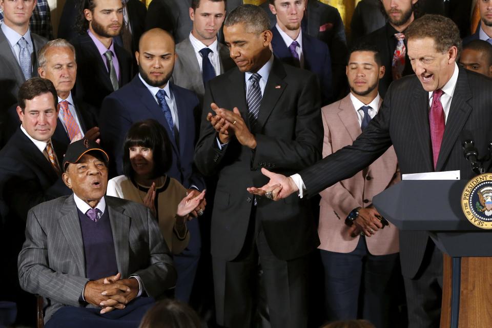 U.S. President Barack Obama (C) and San Francisco Giants CEO Larry Baer introduce Hall of Fame player Willie Mays (L) during a reception for the Giants, Major League Baseball's 2014 World Series champions, in the East Room of the White House in Washington, June 4, 2015. REUTERS/Jonathan Ernst