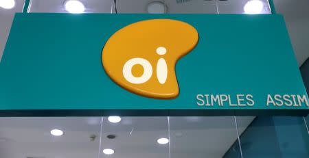 The logo of Brazilian telecoms company Oi SA is pictured inside a store in Sao Paulo, Brazil July 18, 2018. REUTERS/Paulo Whitaker