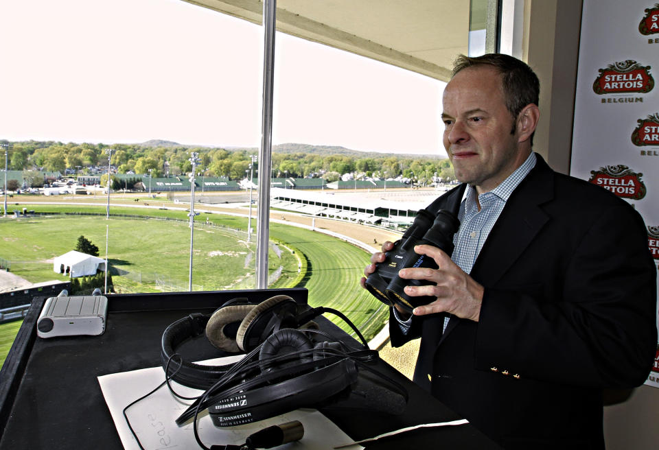 New track announcer Larry Collmus checks out his booth high atop the grandstand at Churchill Downs in Louisville, Ky., Wednesday, April 23, 2014. Collmus replaces British announcer Mark Johnson, who had called Churchill races since 2009. (AP Photo/Garry Jones)