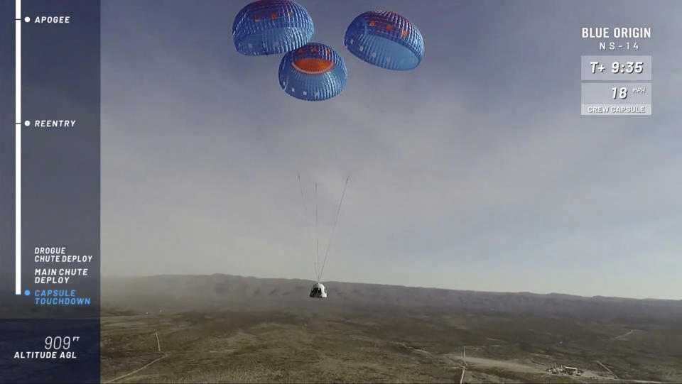 In this image from video made available by Blue Origin, the company's RSS First Step capsule uses parachutes for landing after a test flight in West Texas on Thursday, Jan. 14, 2021. (Blue Origin via AP)