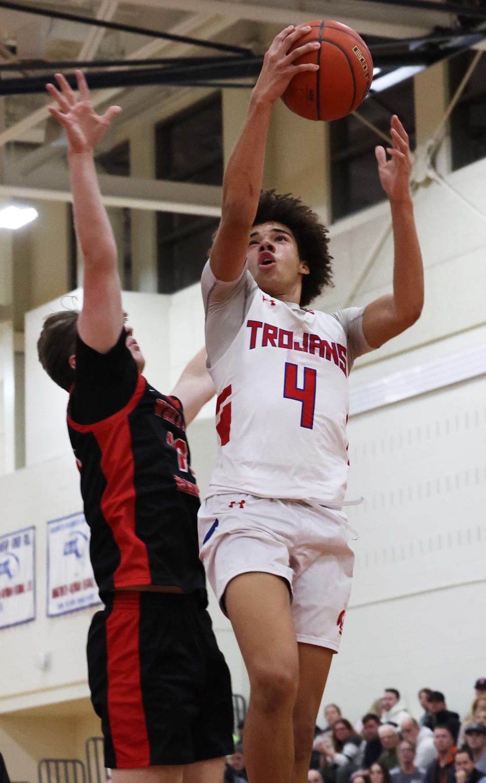 Bridgewater-Raynham's Deshawn Faulk goes up for a layup during a game versus Whitman-Hanson on Thursday, Dec. 21, 2023. Bridgewater-Raynham won the game in double overtime 75-72.