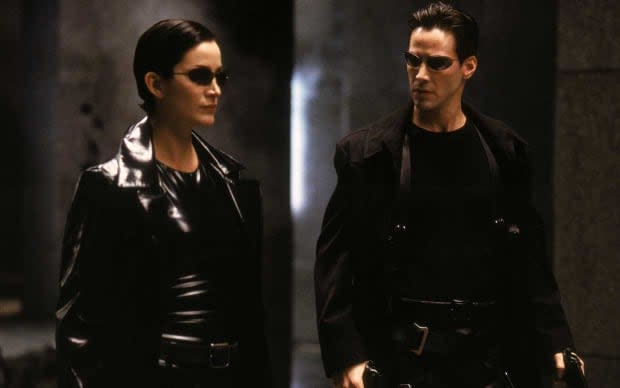 Carrie-Anne Moss and Keanu Reeves in "The Matrix"<p>Warner Bros.</p>