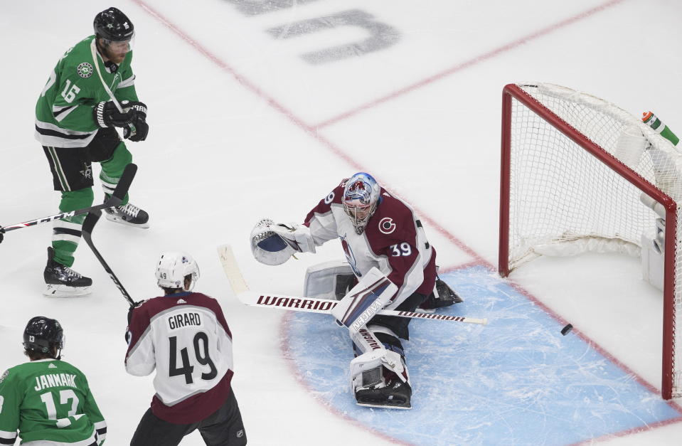 Dallas Stars' Joe Pavelski (16) is stopped by Colorado Avalanche's goalie Pavel Francouz (39) during the second period of an NHL hockey second-round playoff series, Sunday, Aug. 30, 2020, in Edmonton, Alberta. (Jason Franson/The Canadian Press via AP)