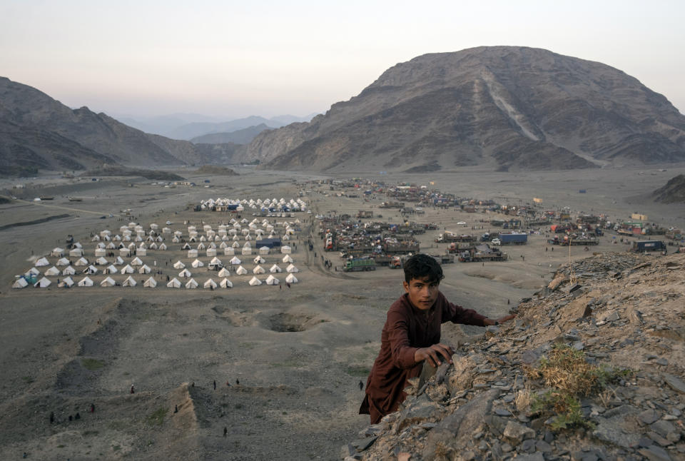 A general view of a camp where Afghan refugees are accommodated at in the Torkham Pakistan-Afghanistan border, in Torkham, Afghanistan, Friday, Nov. 3, 2023. A huge number of Afghan refugees entered the Torkham border to return home hours before the expiration of a Pakistani government deadline for those who are in the country illegally to leave or face deportation. (AP Photo/Ebrahim Noroozi)