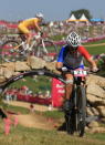 HADLEIGH, ESSEX - AUGUST 11: Pauline Prevot Ferrand of France competes during the Women's Cross-country Mountain Bike race on Day 15 of the London 2012 Olympic Games at Hadleigh Farm on August 11, 2012 in Hadleigh, England. (Photo by Phil Walter/Getty Images)