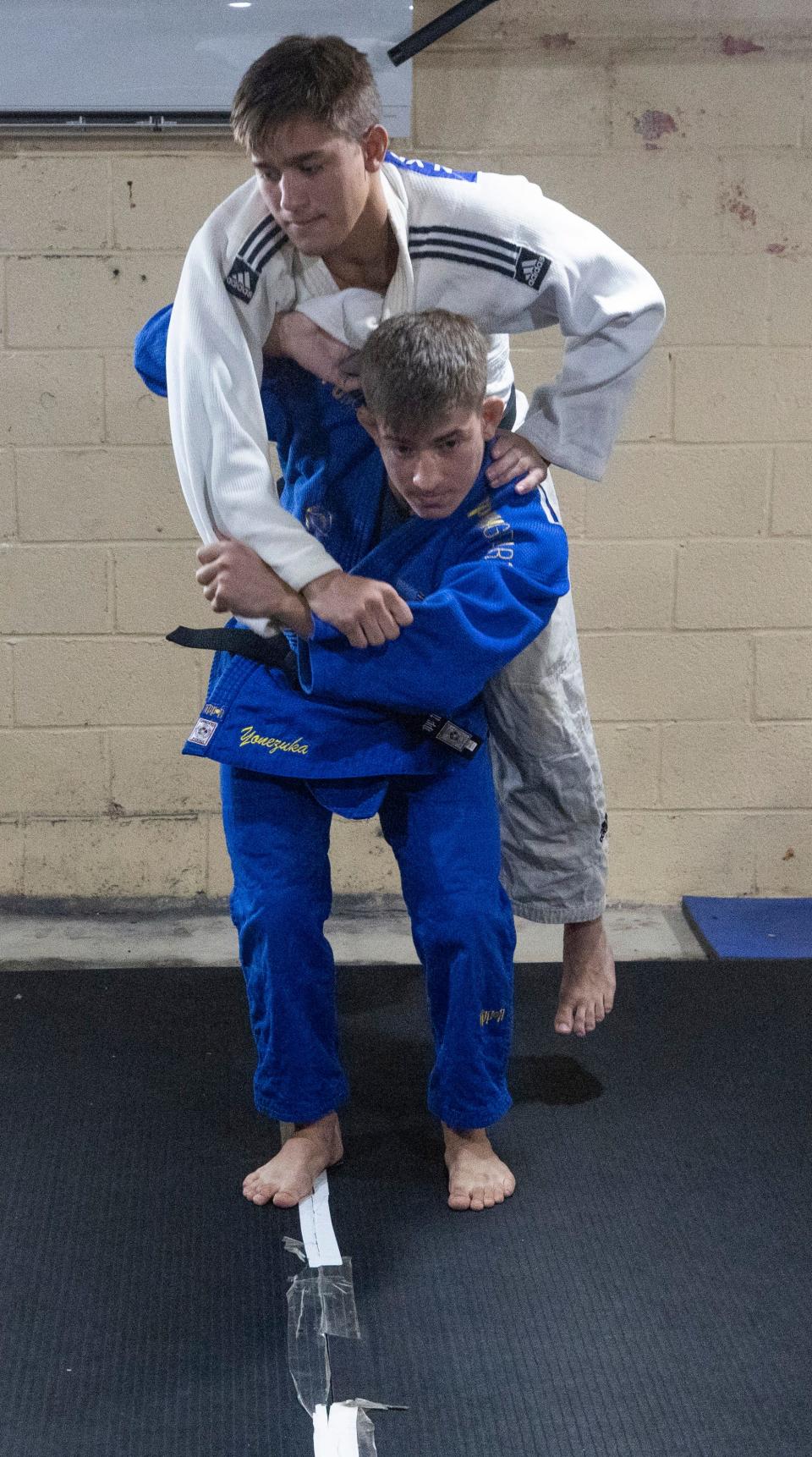 Nick Jr.and brother Jack work out in their basement. The Yonezuka family, who are all outstanding in Judo, at their West Long Branch home on August 30, 2022.