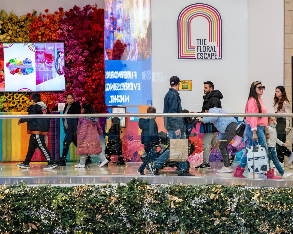 People shop the stores at Garden State Plaza in Paramus, NJ on Friday, November 18, 2022. 