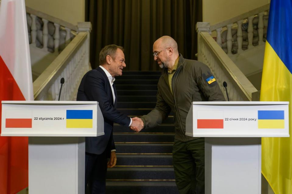 Polish Prime Minister Donald Tusk (L) and Ukrainian Prime Minister Denys Shmyhal are shaking hands after a joint press conference in Kyiv, Ukraine, on Jan. 22, 2024. (Maxym Marusenko/NurPhoto via Getty Images)