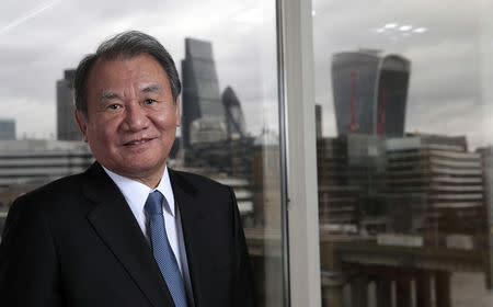Nikkei Chairman Tsuneo Kita poses for a photograph at the Financial Times headquarters in London, Britain November 30, 2015. REUTERS/Suzanne Plunkett