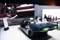 <p><span>Samsung is another tech giant getting in on the automotive action. At the <strong>CES show </strong>in 2020, it presented its <b>Digital Cockpit</b> – and used a pretty convincing prototype car to show it. Within the four-seat convertible’s cabin which it built with subsidiary <strong>Harman</strong>, Samsung showcased its future vision of <b>in-car entertainment and safety</b>.</span></p><p><span>Samsung’s Digital Cockpit uses <strong>5G </strong>to link features inside and outside the car to give drivers and passengers a more connected experience. Inside, there are <strong>eight displays</strong>, eight cameras and the car can share </span><span>information with other cars by displaying messages on its rear <strong>exterior display.</strong></span></p>