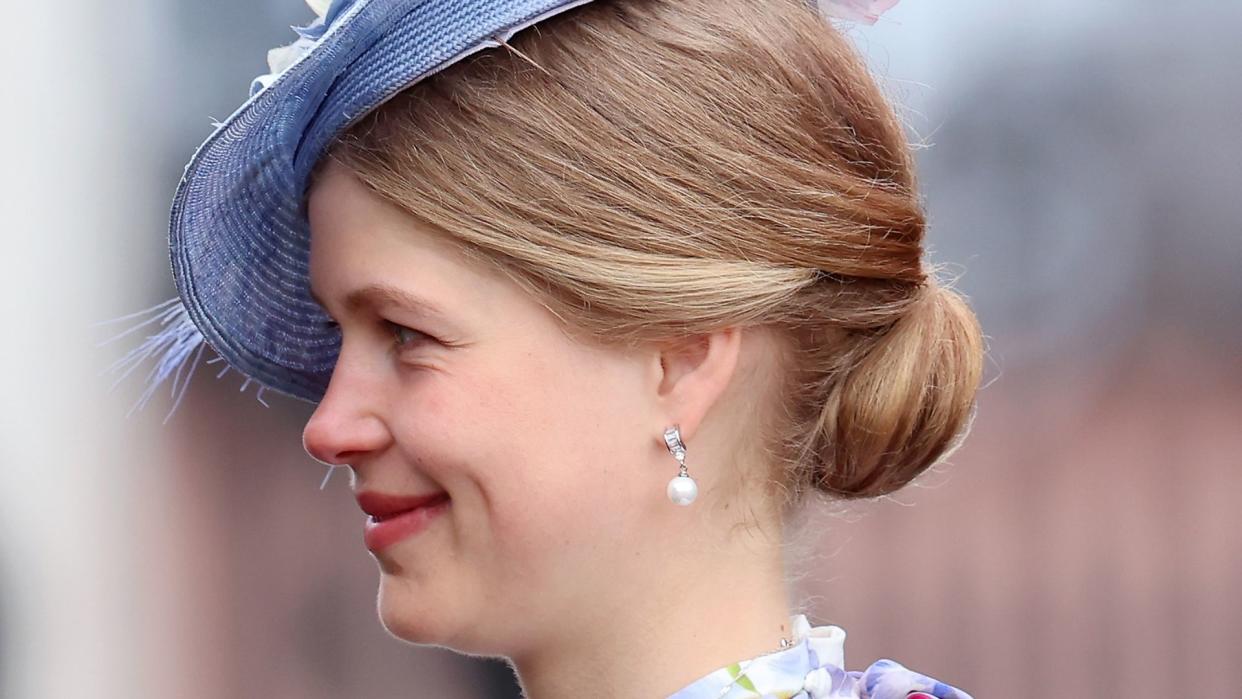 Lady Louise Windsor side profile in blue hat