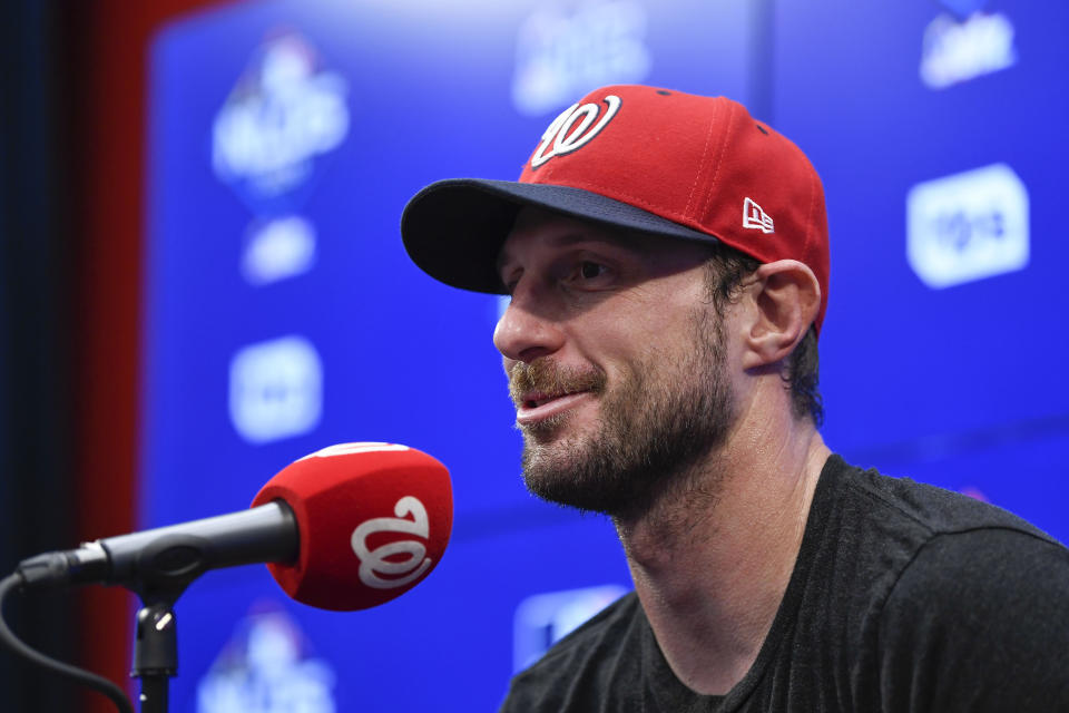 Washington Nationals pitcher Max Scherzer speaking during a news conference before the start of Game 3 of a baseball National League Division Series baseball game against the Los Angeles Dodgers, Sunday, Oct. 6, 2019, in Washington. (AP Photo/Susan Walsh)