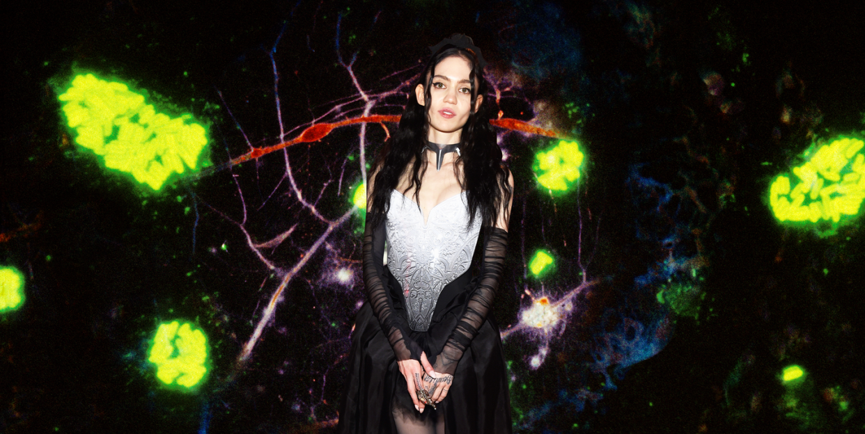 a photo of grimes over a spooky background