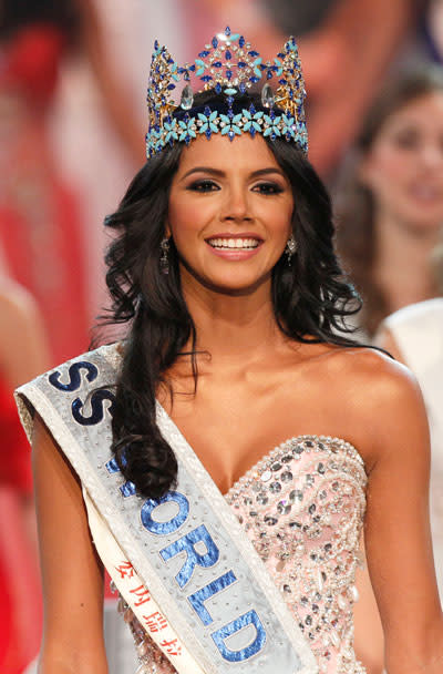 <a href="http://uk.lifestyle.yahoo.com/miss-venezuela-wins-miss-world-crown-104224902.html" data-ylk="slk:Miss World 2011;elm:context_link;itc:0;sec:content-canvas;outcm:mb_qualified_link;_E:mb_qualified_link;ct:story;" class="link  yahoo-link">Miss World 2011</a>:Miss Venezuela Ivian Sarcos reacts as she is crowned winner at the Miss World beauty competition.