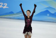 Gold medalist, Anna Shcherbakova, of the Russian Olympic Committee, poses after the women's free skate program during the figure skating competition at the 2022 Winter Olympics, Thursday, Feb. 17, 2022, in Beijing. (AP Photo/Natacha Pisarenko)