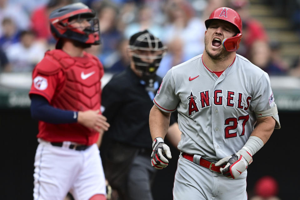 Los Angeles Angels' Mike Trout reacts after being hit by a pitch during the third inning of the team's baseball game against the Cleveland Guardians, Saturday, May 13, 2023, in Cleveland. (AP Photo/David Dermer)