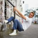<p>Kevin Costner in 1990 doing what—we don't know. But check out those sneakers. </p>