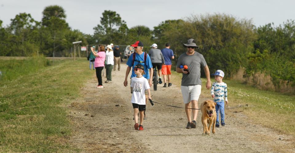 A crowd of people went to the Ritch Grissom Memorial Wetlands in Viera on Monday to view birds and other wildlife.