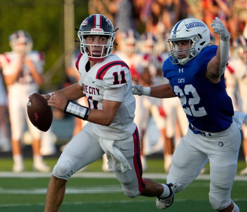 Grove City quarterback Matthew Papas looks for a receiver against Hilliard Davidson on Aug. 25.