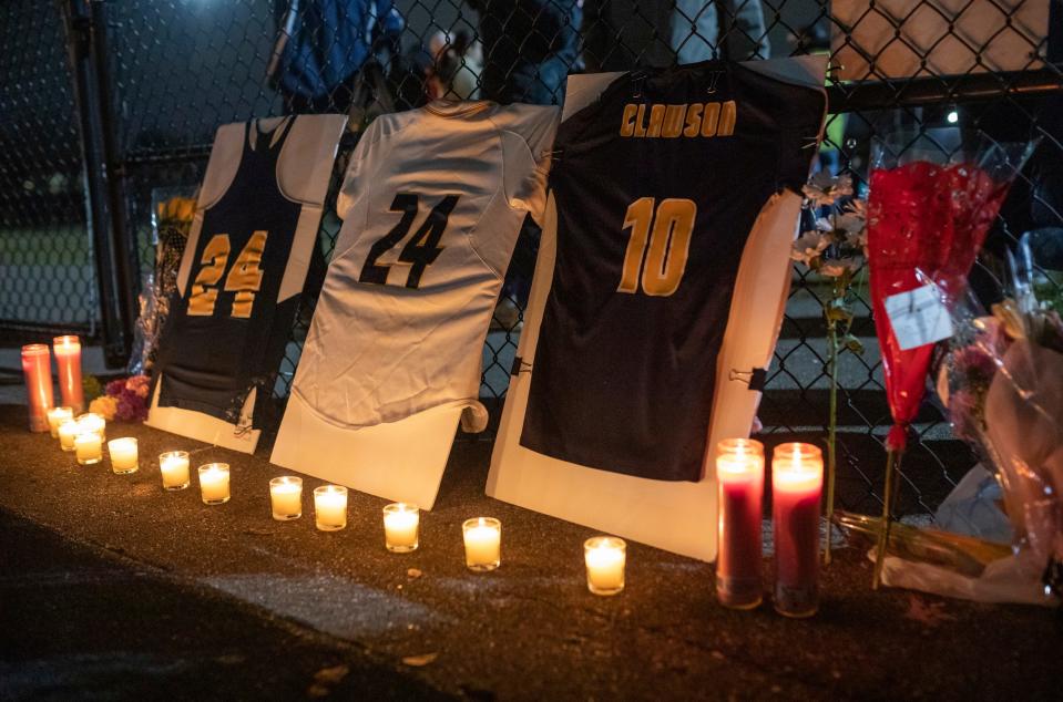 A memorial sits at the Clawson City Park during a vigil to honor one of their own, Alexandria 'Alex' Verner, along with other MSU shooting victims in Clawson on Tuesday, Feb. 14, 2023.