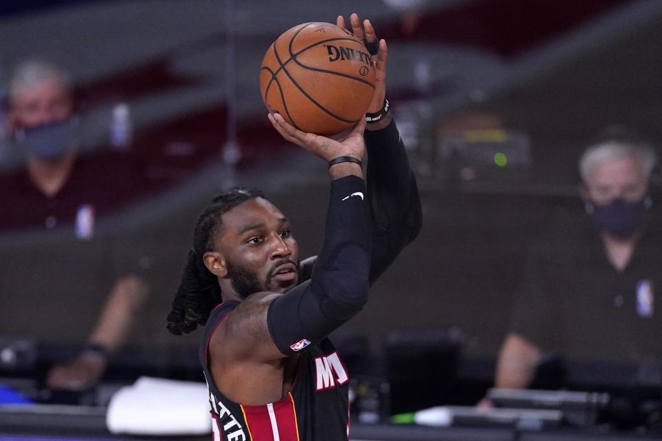 Miami Heat's Jae Crowder attempts a shot during the first half of an NBA conference final playoff basketball game against the Boston Celtics on Saturday, Sept. 19, 2020, in Lake Buena Vista, Fla. (AP Photo/Mark J. Terrill)