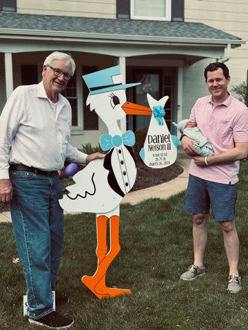 <p>Daniel Lesinski Jr.</p> From Left: Daniel Lesinski Sr. and Daniel Lesinski Jr., who is holding Daniel Lesinski III