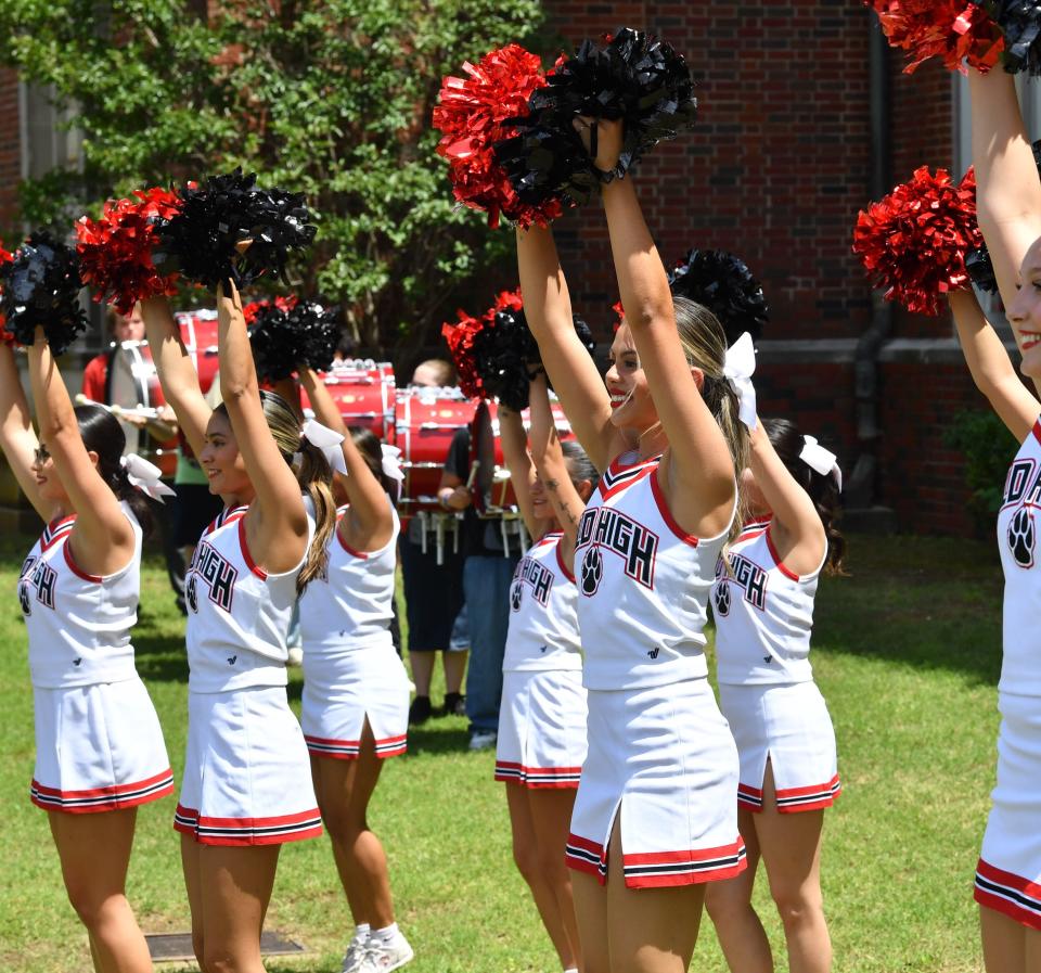 Wichita Falls High School cheerleaders perform during the school closing ceremony on Wednesday.