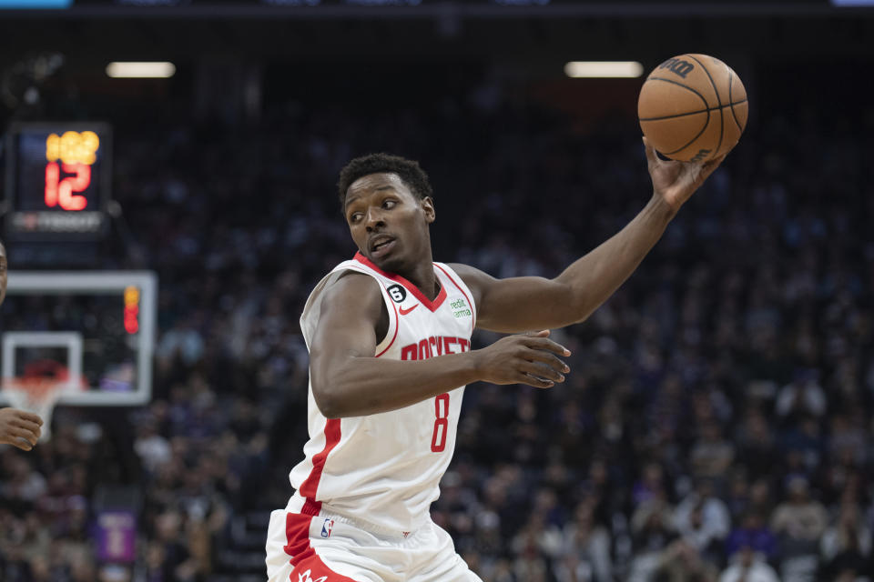 Houston Rockets forward Jae'Sean Tate (8) gets possession of the ball during the first half of the team's NBA basketball game against the Sacramento Kings in Sacramento, Calif., Wednesday, Jan. 11, 2023. (AP Photo/José Luis Villegas)