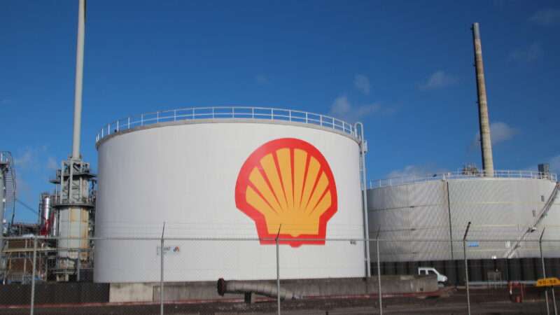 An oil storage tank bearing the Shell Oil logo, at a harbor in Rotterdam, The Netherlands.