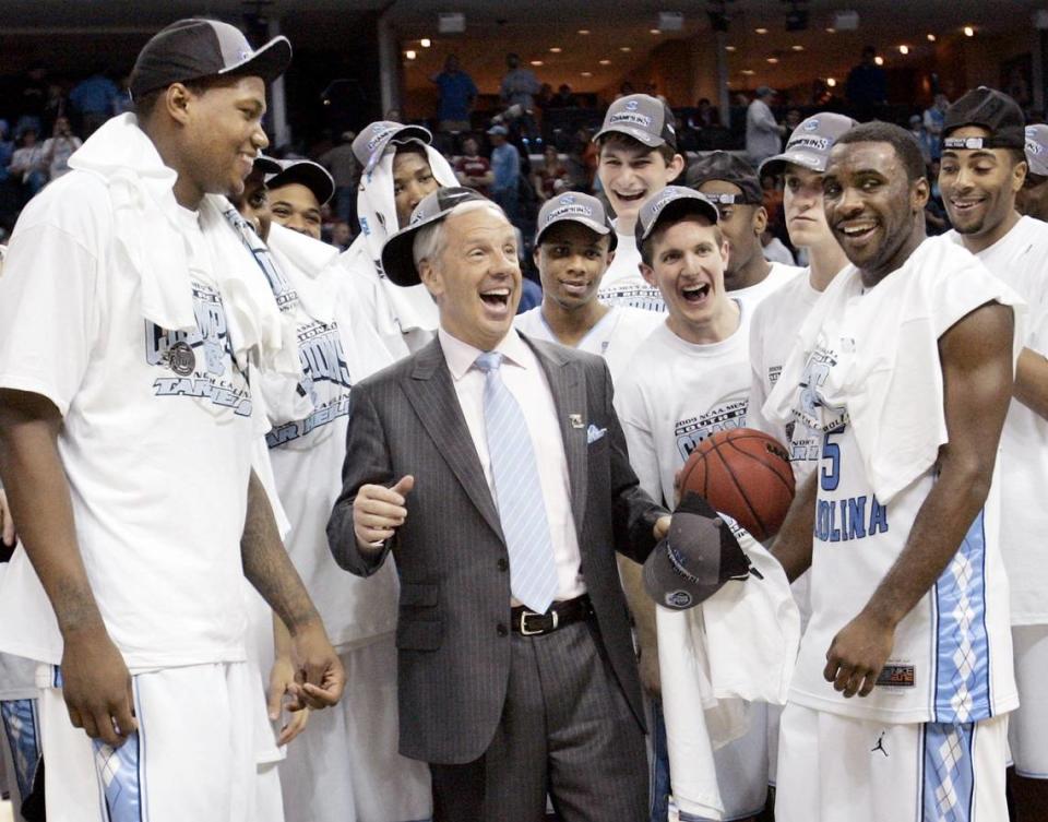 UNC coach Roy Williams reacts to someone putting his hat on crooked as the Tar Heels celebrate winning the NCAA South Regional Championship game against Oklahoma at FedExForum in Memphis, TN, on Sunday, March 29, 2009.