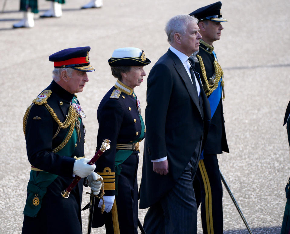 Britain's King Charles, Princess Anne, Princess Royal, Prince Andrew, Duke of York and Prince Edward, Earl of Wessex walk behind Queen Elizabeth's coffin during the procession from the Palace of Holyroodhouse to St Giles' Cathedral, Edinburgh, Scotland, Britain September 12, 2022. Peter Byrne/Pool via REUTERS